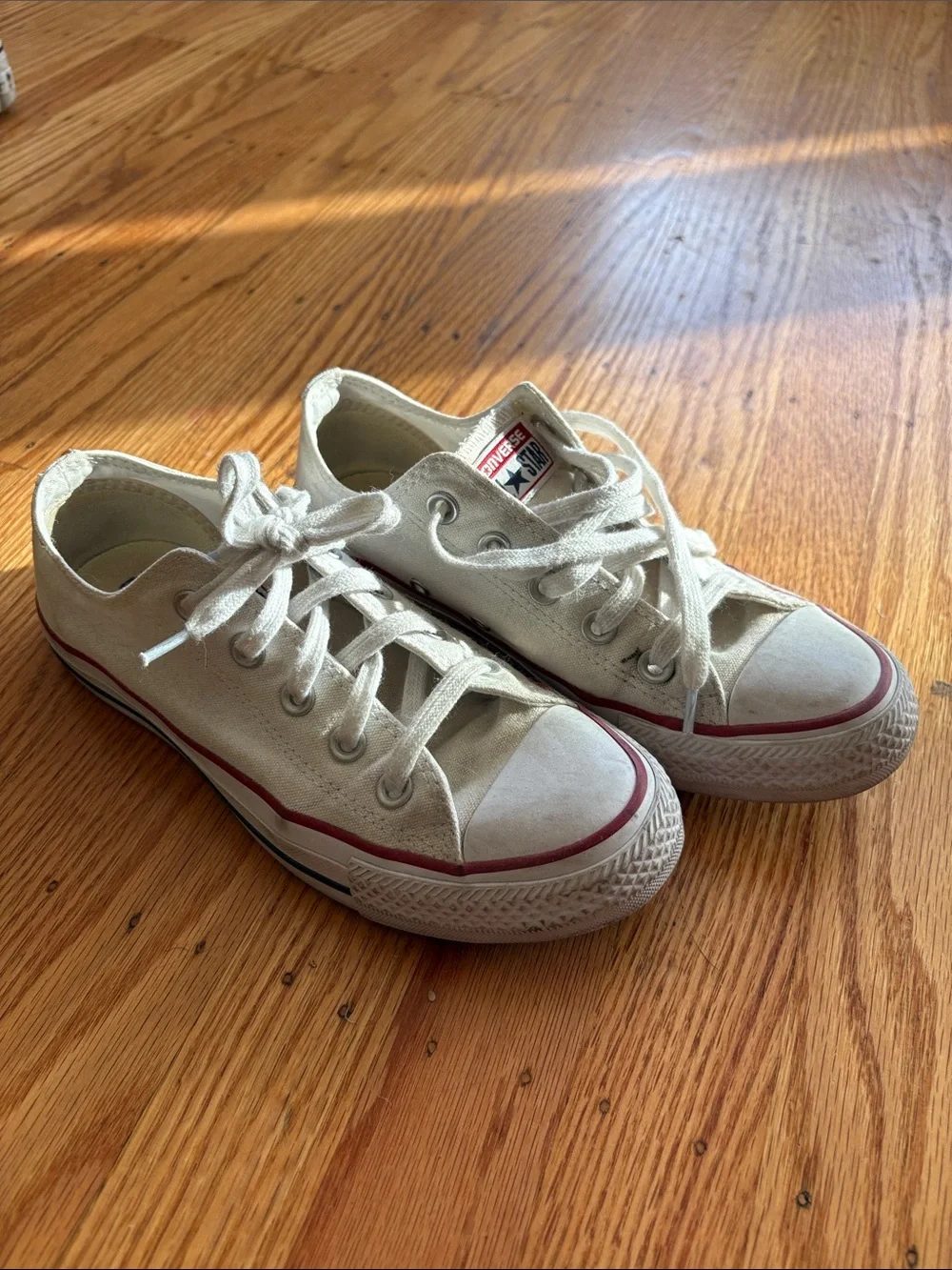 Converse Low Top Sneakers in Off-White with Red Stripe